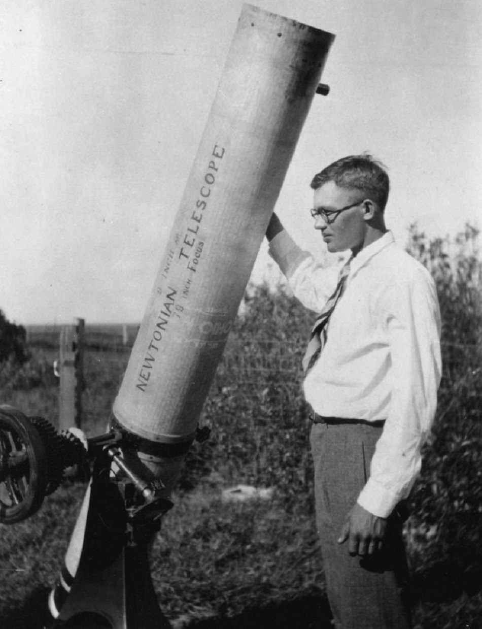 Clyde Tombaugh with his homeade telescope